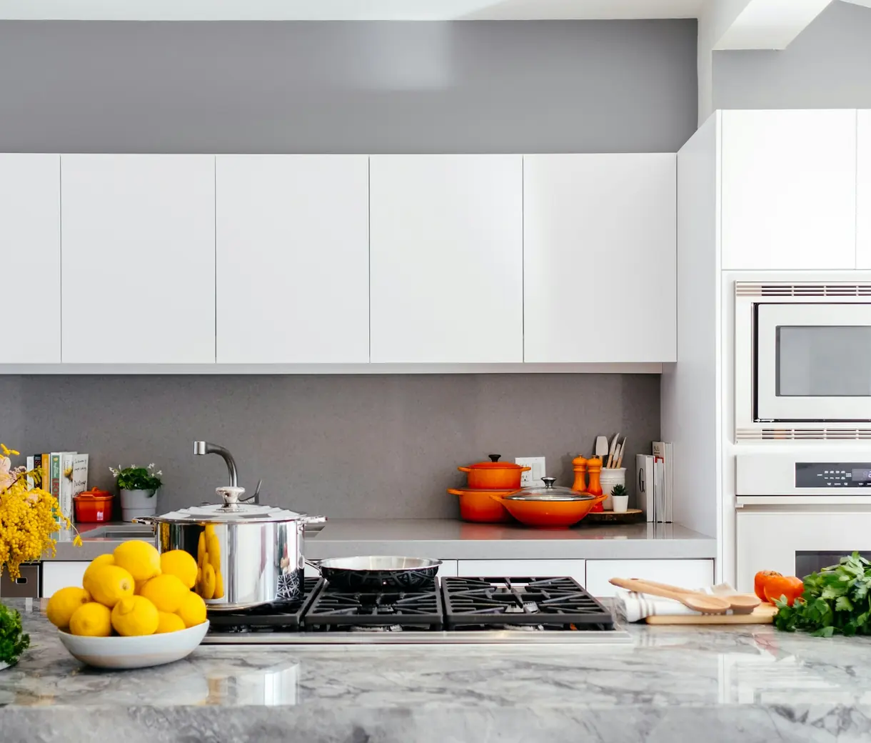 Bright, sunlit kitchen with clean countertops and natural light